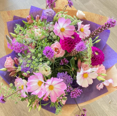 Lavender Kiss - Elegant and distinctive, Lavender Kiss captures the beauty of soft pink and lilac tones with a touch of cool sophistication. Blended with lush green foliage, this graceful bouquet brings calm elegance and quiet charm to any space — a perfect gift for any occasion.
