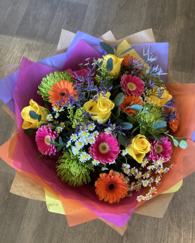 Mamma Mia - Make their day with this bright and vibrant collection of flowers, beautifully presented in a gift box / bag.