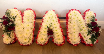Nan Letter Tribute - NAN funeral letter tribute in white chrysanthemums with red rose clusters and ribbon edge, handcrafted by Sweetpea and Willow Florist.