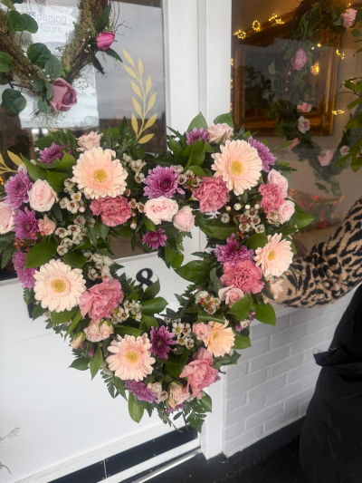 Pink & Plum Heart - Pink and plum open heart funeral tribute with gerberas and roses, handcrafted by Sweetpea and Willow Florist.